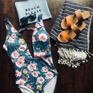 Floral one piece swimsuit. Never Worn.